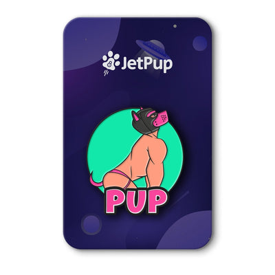 An enamel pin with a green background featuring an illustration of a human pup with a pink collar and the text 'PUP' on it, packaged in a rectangular card with the brand 'JetPup' at the top.