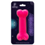 A neon pink bone-shaped silicone chew toy for human puppies, packaged on a black card with product information.