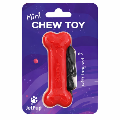 Red bone-shaped chew toy with a lanyard on a purple packaging background, featuring the JetPup brand.