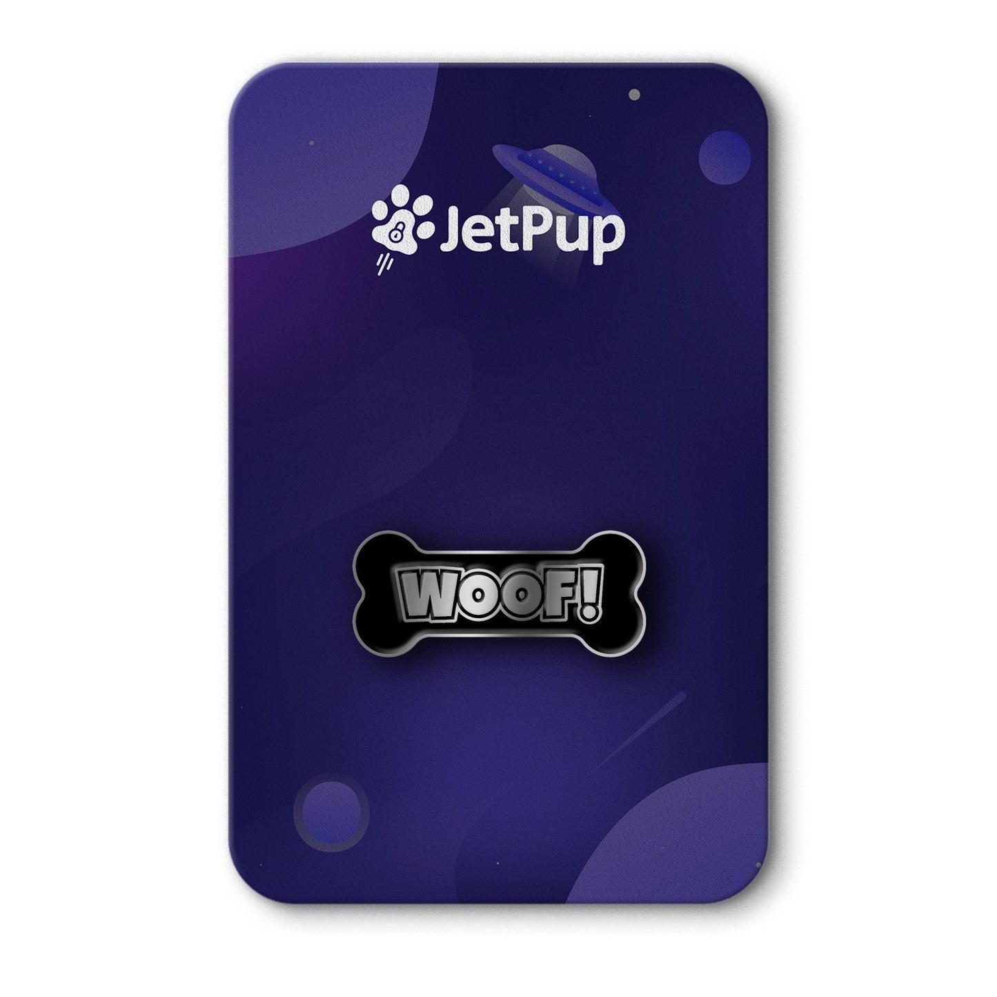 A shiny black and chrome enamel pin with 'WOOF!' text on a bone-shaped backing, displayed on a space theme background with the JetPup logo.